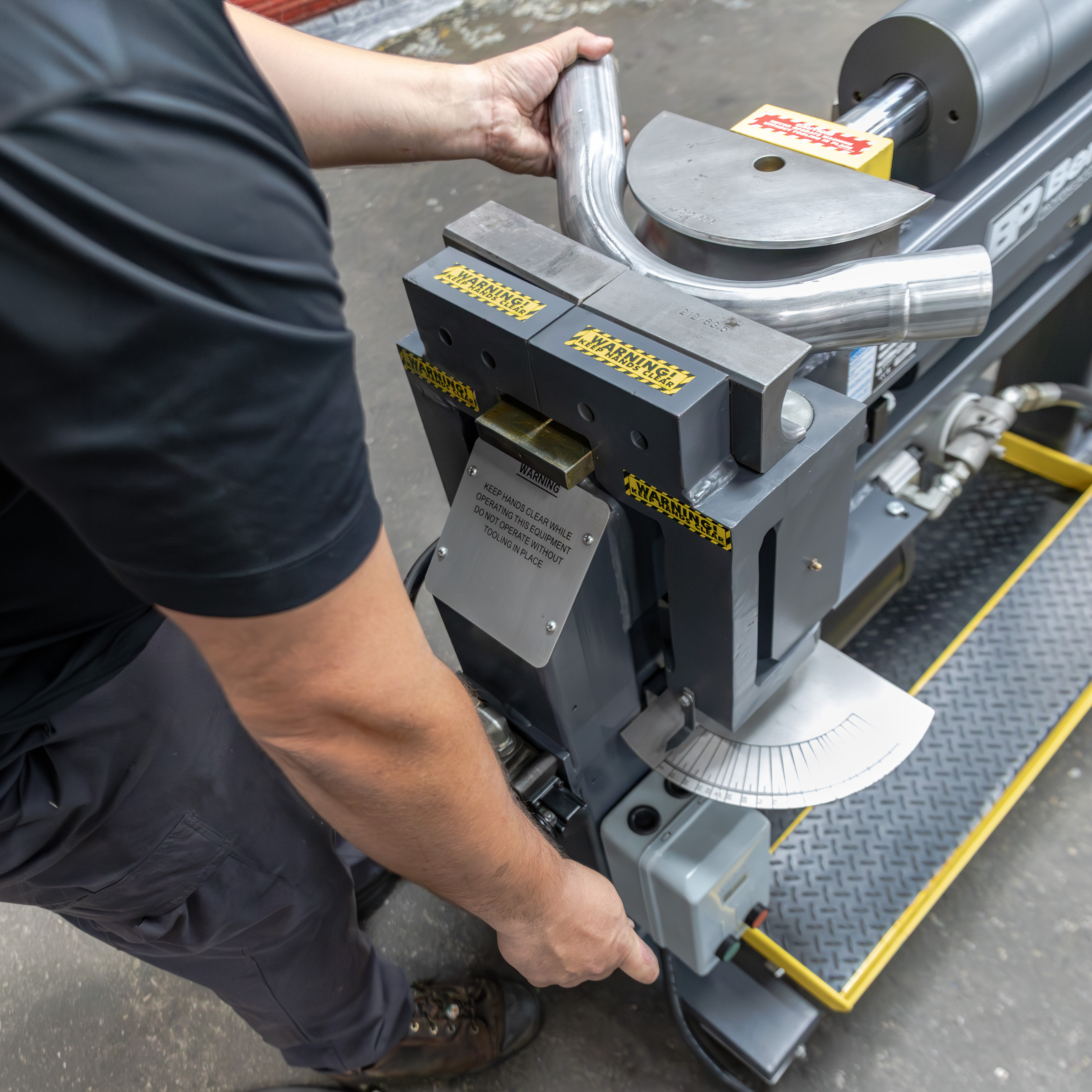 Rigid Steel Frame, Hydraulic Power, and Precision Tooling