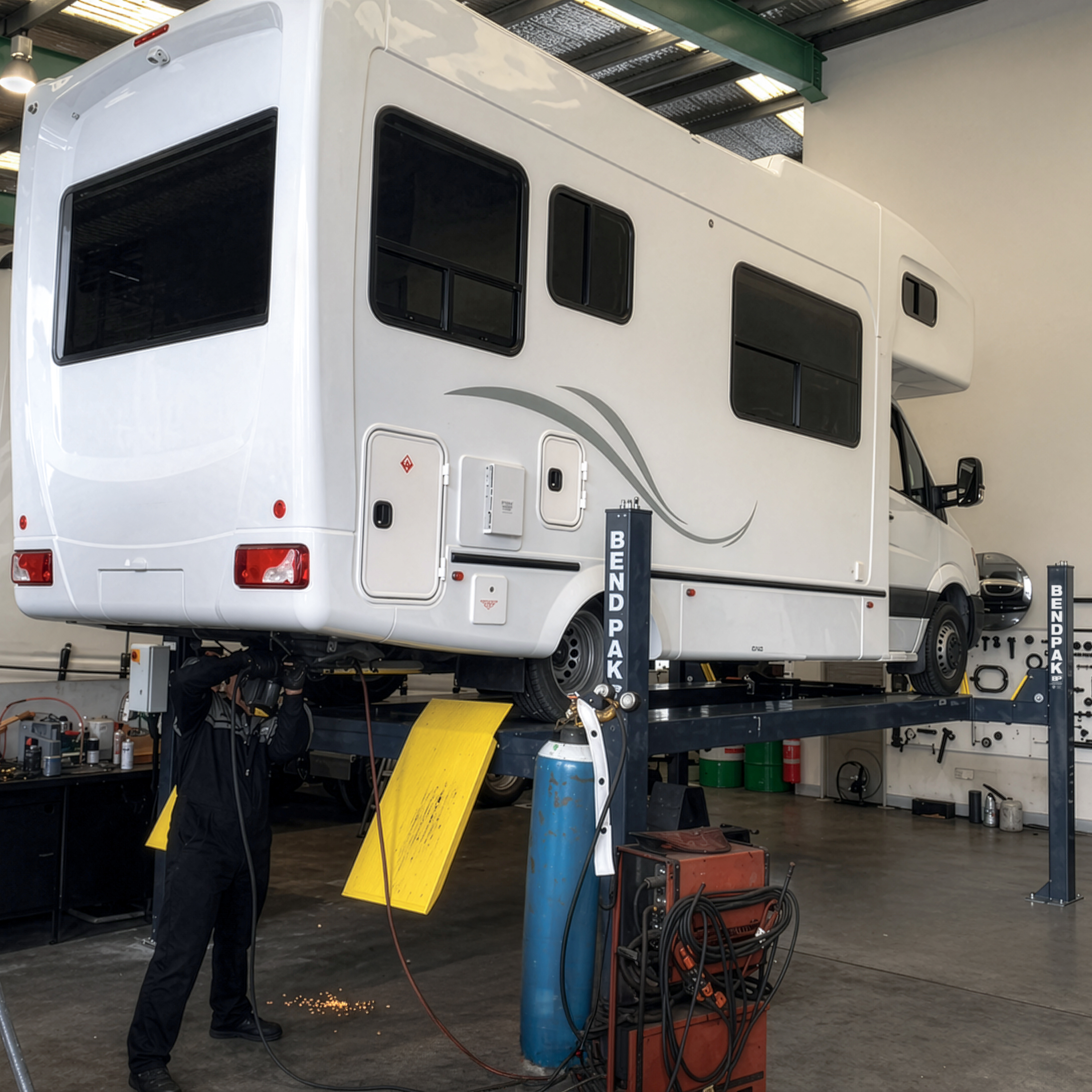 Extended Four-Post Lift Design for Large Vehicle Service