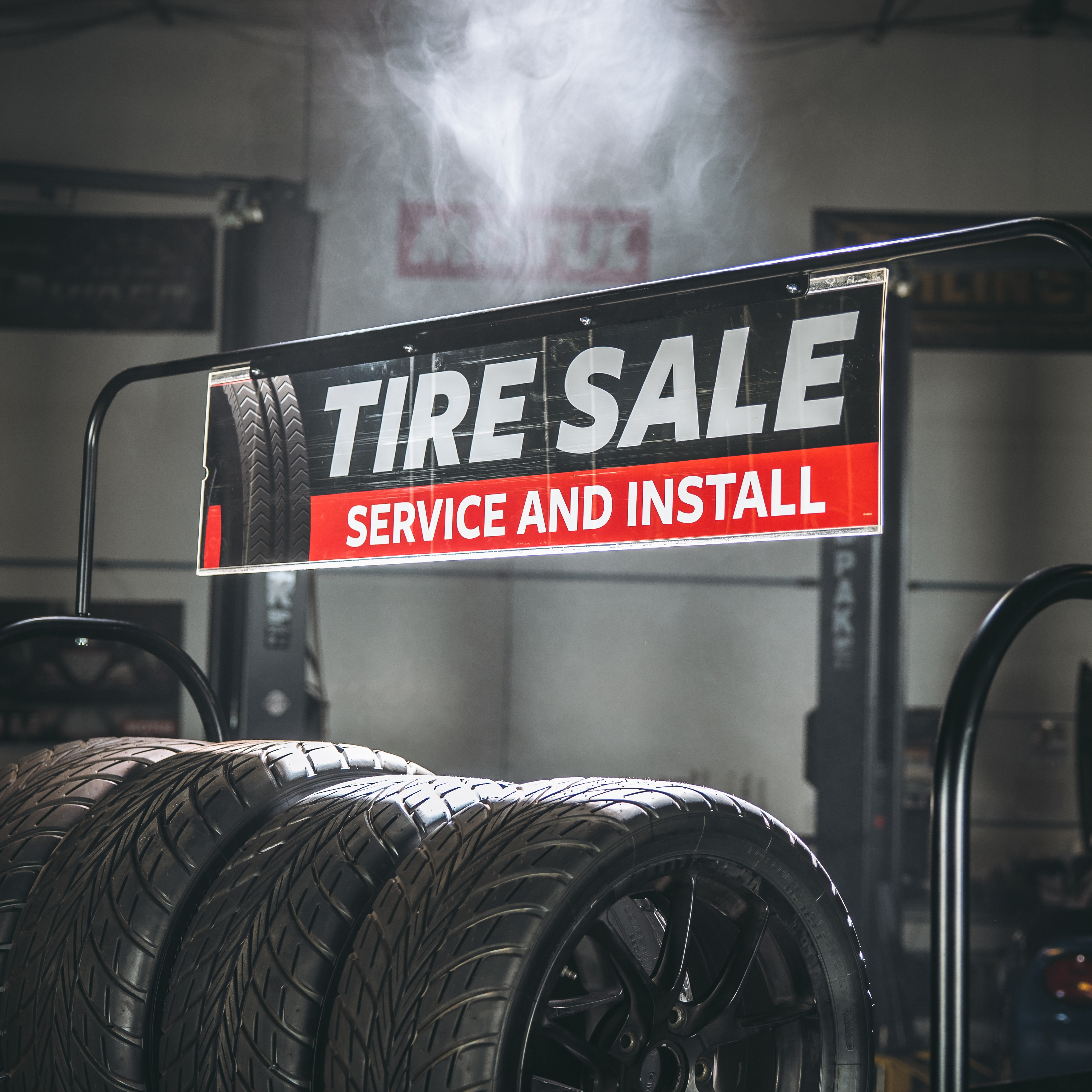 Professional Tire Display Rack with Built-In Sign Holder